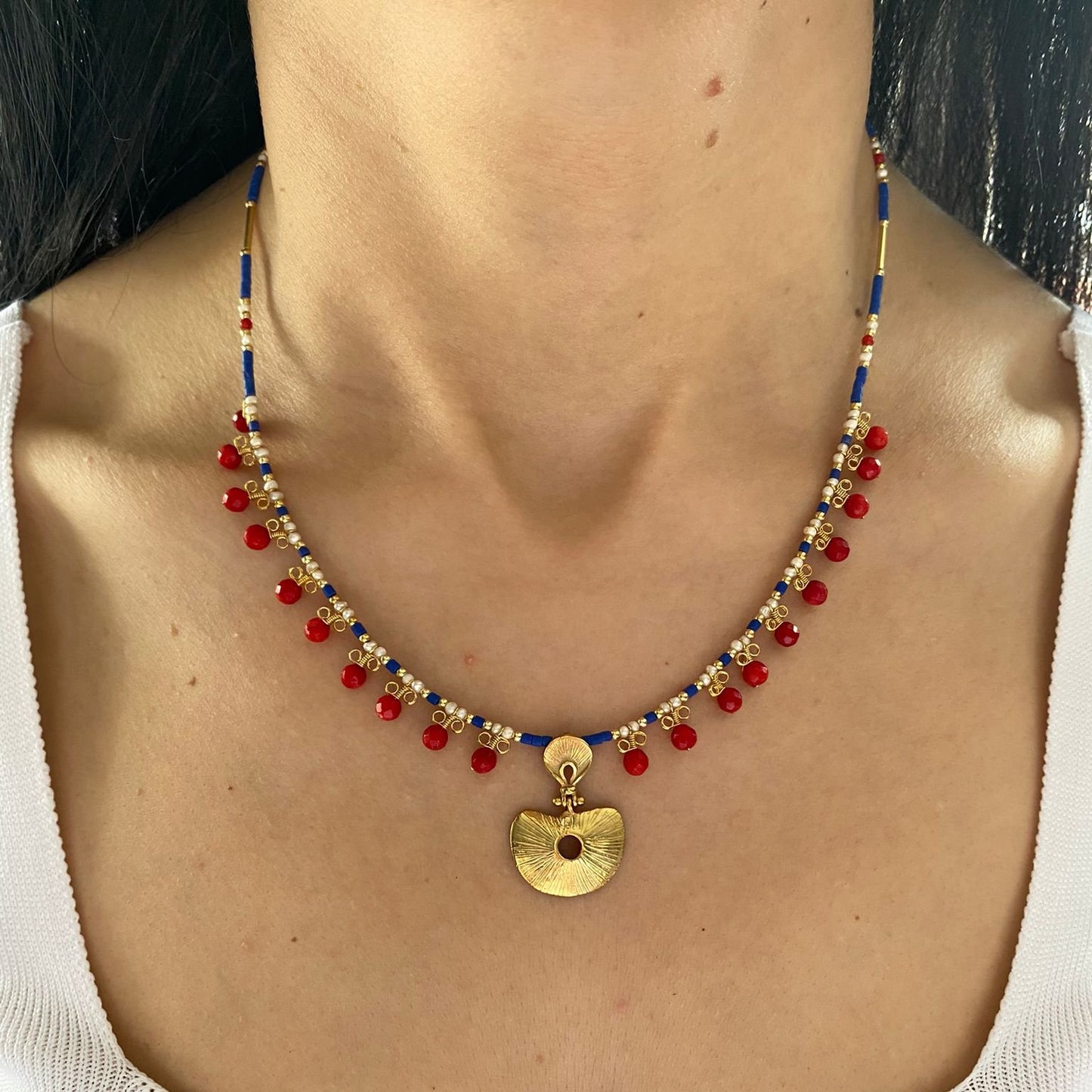 Hera Coral and Lapis Lazuli Gemstone Necklace in 925 Silver with Gold Plating worn by a model