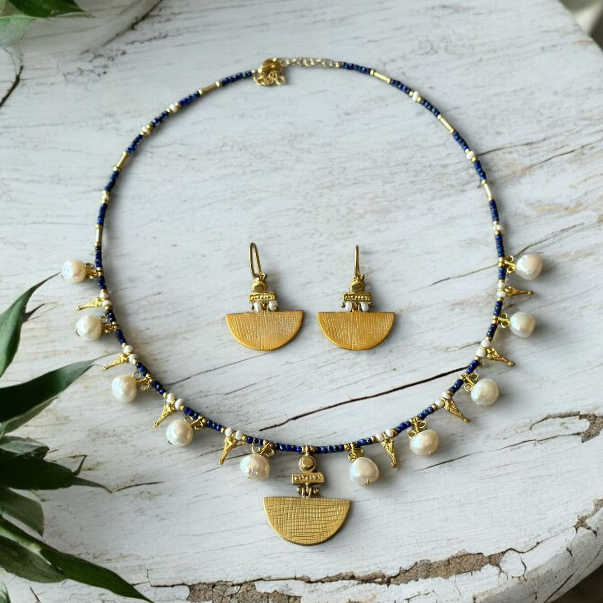 Selena Lapis Lazuli Necklace and Earrings Set - 14K Gold Plated with Pearl Accents on Rustic White Background
