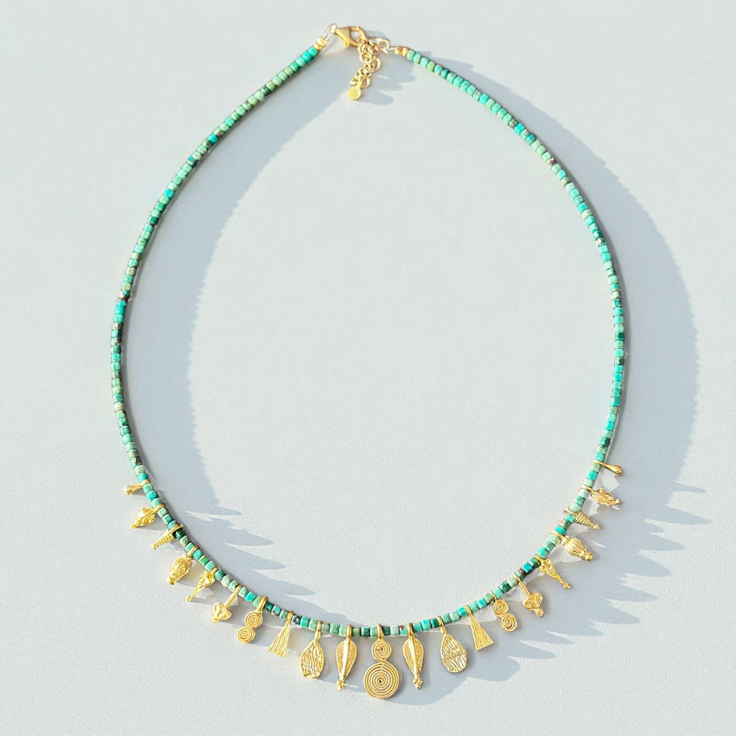 Turquoise Charm Necklace – Gold Plated Ancient Symbols