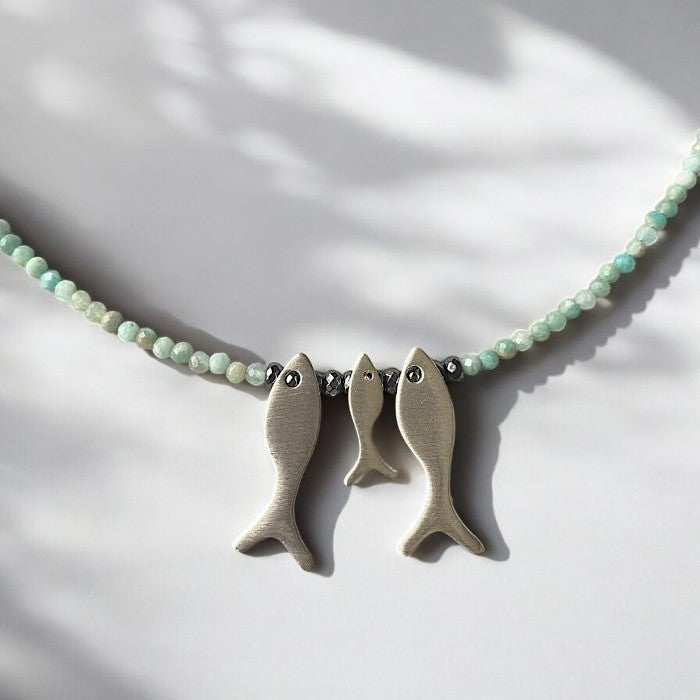 Amazonite gemstone necklace with three fish-shaped silver pendants, a unique jewellery piece for mothers and loved ones.