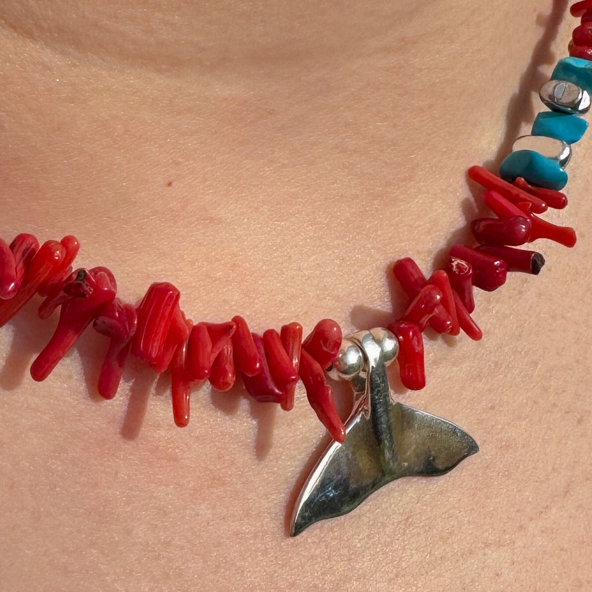 Coral starfish necklace crafted from 925 silver, featuring vibrant red coral beads and a delicate handmade design.